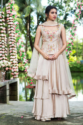 layered lehenga ,peplum blouse and dupatta