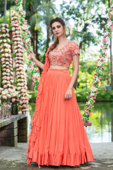 coral lehenga set with frill dupatta