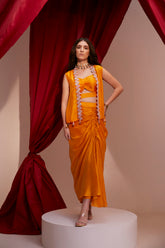 HAND EMBROIDERED SHORT JACKET WITH RUCHED BLOUSE PAIRED WITH DRAWSTRING DRAPE SKIRT