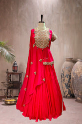 red peplum cape lehenga set.